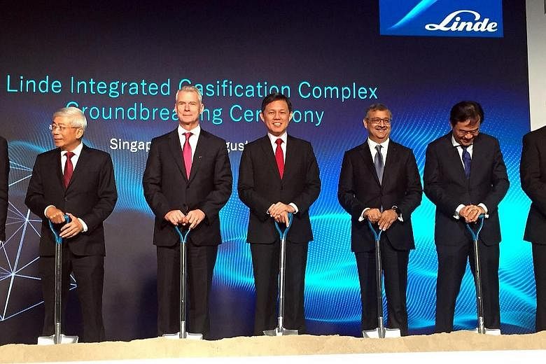 Trade and Industry Minister Chan Chun Sing (centre) at Linde's ground-breaking event with (from left) ExxonMobil Asia-Pacific managing director Gan Seow Kee; Linde CEO Steve Angel; Linde Asia-Pacific CEO Sanjiv Lamba; and Economic Development Board e