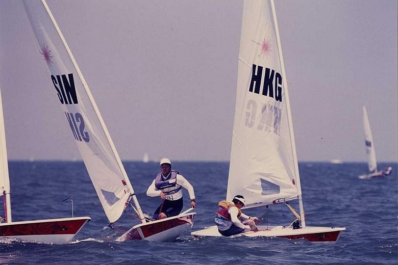 Top: Former national sailor Benedict Tan will be Singapore's chef de mission at next year's Tokyo Olympics. ST PHOTO: LIM YAO HUI Tan, pictured in action at the Atlanta Olympics in 1996, when he finished 36th out of 56. Now 51, he is head of SingHeal