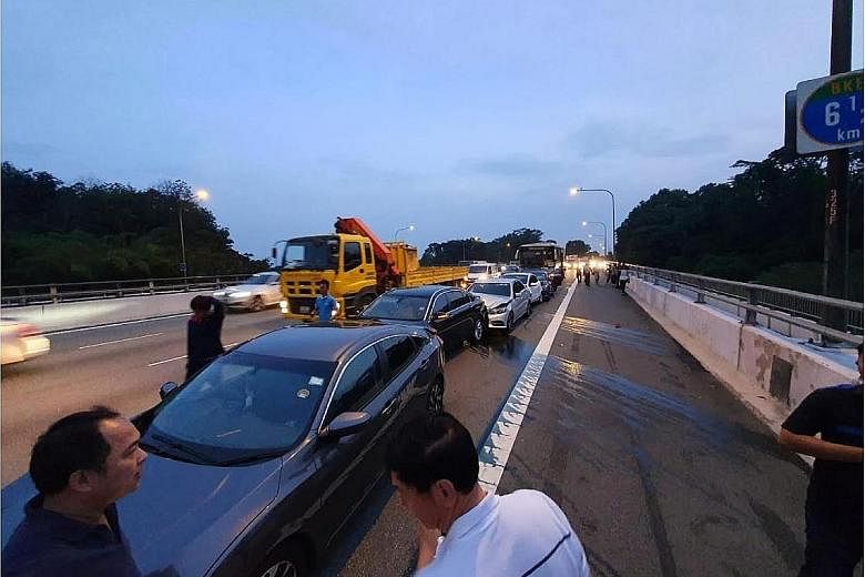 The chain collision on Bukit Timah Expressway on Wednesday involved six cars and a bus. Four people were taken to hospital.