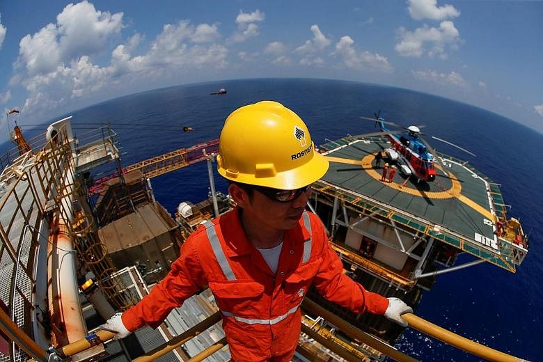 An oil company employee on a gas platform in the South China Sea. Philippine President Rodrigo Duterte and his Chinese counterpart Xi Jinping have agreed to continue dialogue and work on a code of conduct by 2021.