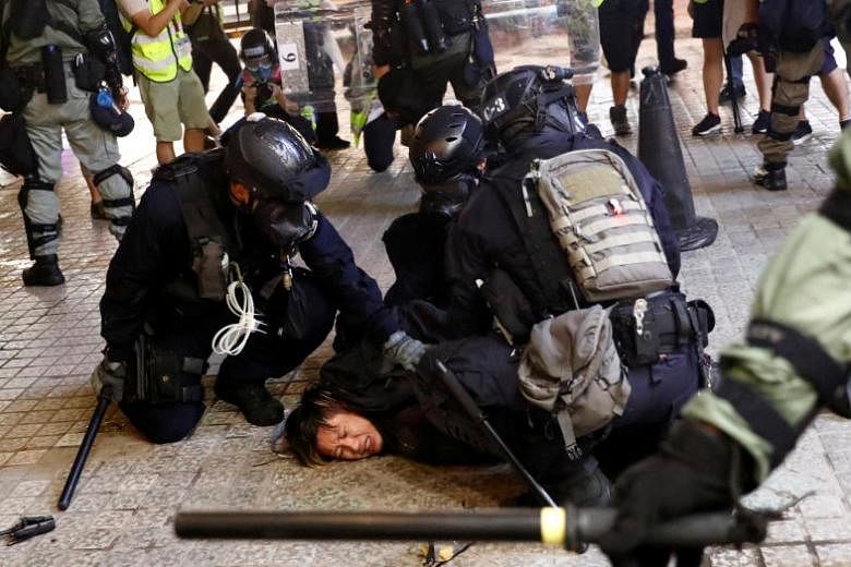 Police fire water cannons, tear gas after Hong Kong protesters occupy ...