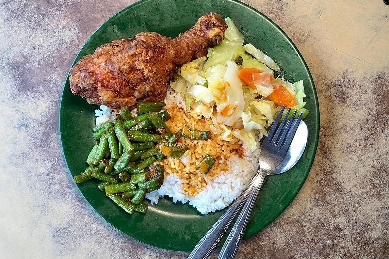 At Kranji Food Stall operated by Madam Wendy Koh, a plate of rice with a fried chicken drumstick and two vegetable dishes costs $3.30 (above). 