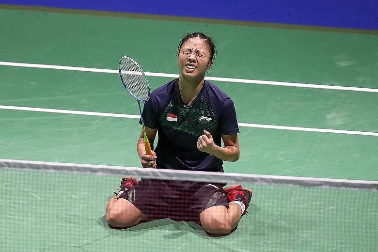 Left: A relaxed Yeo Jia Min at home. Among her areas for improvement are footwork and mental strength. ST PHOTO: GIN TAY Below: The ecstatic shuttler on her knees after stunning world No. 1 Akane Yamaguchi at the World Championships in Basel. PHOTO: 