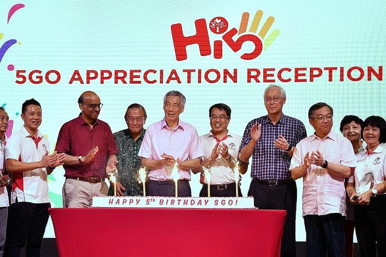 (From left) Silver Generation Office (SGO) group chief Yip Hon Weng, Senior Minister Tharman Shanmugaratnam, Agency for Integrated Care (AIC) chairman Gerard Ee, Prime Minister Lee Hsien Loong, AIC chief executive Tan Kwang Cheak, Emeritus Senior Min