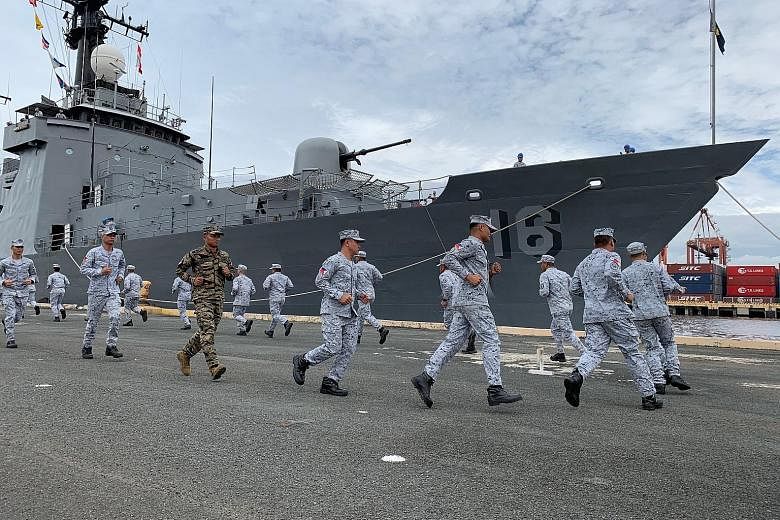 Philippine navy personnel taking part in a send-off ceremony for navy ship BRP Ramon Alcaraz (PS16) in Manila last Thursday. The ship will be part of the first-ever joint maritime exercise between the United States and Asean. The exercise, which star