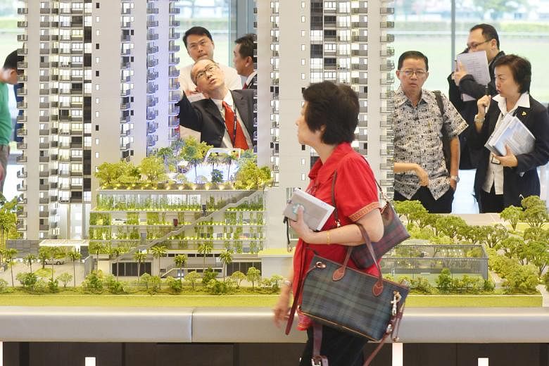 Going forward, analysts expect tax collection, in areas such as corporate income tax and stamp duties for property sales, to slow given the current economic slowdown. ST FILE PHOTO