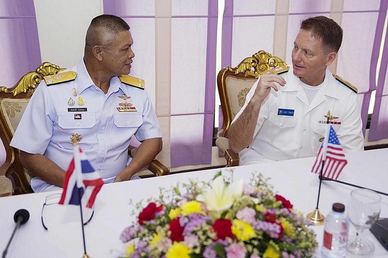 US Navy Rear Admiral Joey Tynch (right) with Royal Thai Navy Rear Admiral Sompong Narkthong during the Asean-US Maritime Exercise on Monday. PHOTO: US NAVY