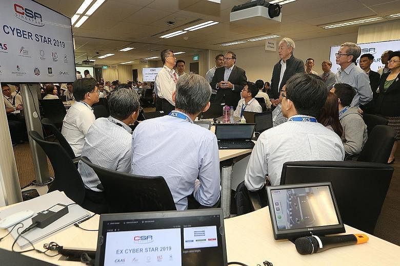 Mr S. Iswaran, Minister for Communications and Information and Minister-in-charge of Cyber Security, and Mr Teo Chee Hean, Senior Minister and Coordinating Minister for National Security, were among several people who observed Exercise Cyber Star at 
