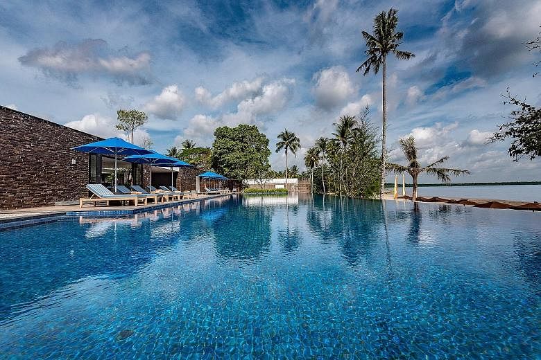 A view of the pool at The Residence Bintan, where subscribers of The Straits Times can stand to win a four-day, three-night stay. The prize package is worth $5,500 and includes accommodation at the premium two-bedroom beachfront villa.