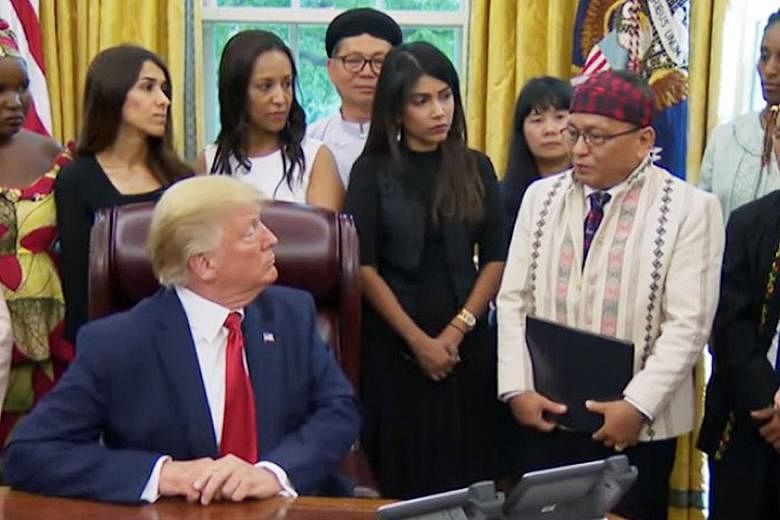 Reverend Hkalam Samson (far right) of Myanmar's Kachin Baptist Convention speaking to US President Donald Trump about religious persecution in Myanmar at the White House on July 17. PHOTO: WHITE HOUSE