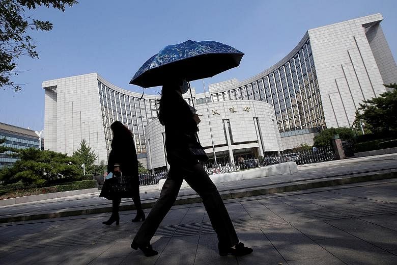 China's central bank said it would cut its reserve requirement ratio - the amount of cash lenders must keep in their coffers - by 0.5 percentage point on Sept 16, adding some 900 billion yuan (S$174 billion) to the economy.