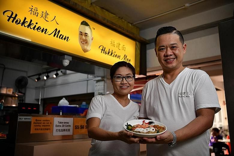 Running the Hokkien mee stall is hard work for Xavier Neo and his wife Alice Lai, but they are determined to press on.