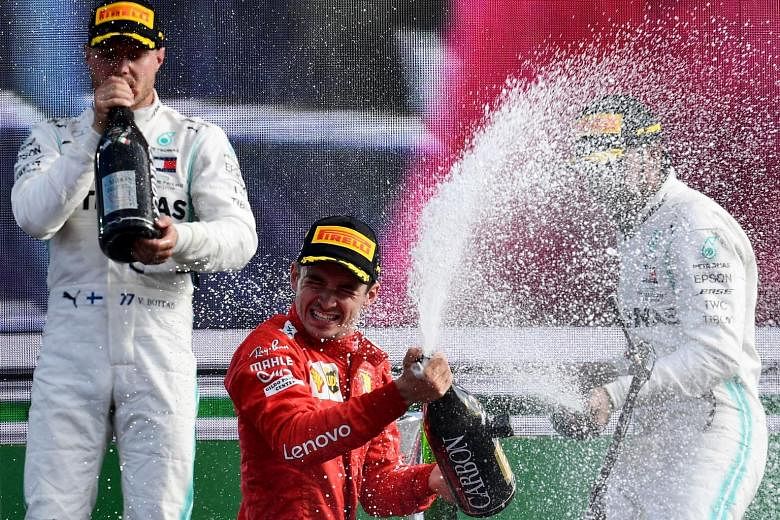 Mercedes' Lewis Hamilton (right) finished third at the Italian Grand Prix after chasing Charles Leclerc (centre) for most of the race. He attempted to overtake, but was forced onto the run-off by the Ferrari driver.