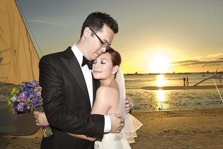 Malaysian singer Fish Leong and Taiwanese businessman Tony Chao (both left) at their beach wedding in Boracay in the Philippines in February 2010.