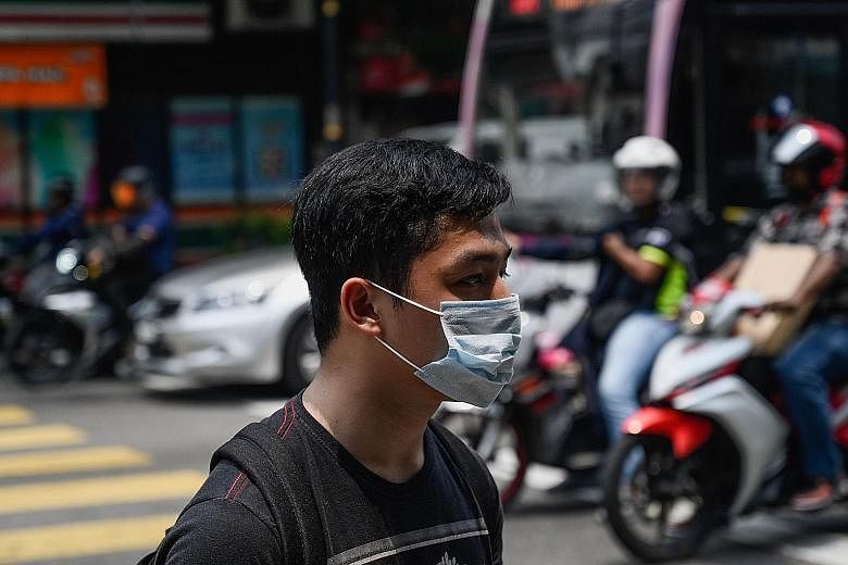 Parts of Malaysia, including Kuala Lumpur (above), have been affected by the haze. Energy, Science, Technology, Environment and Climate Change Minister Yeo Bee Yin said Malaysia will exhaust all diplomatic channels to get Indonesia to act to put out 