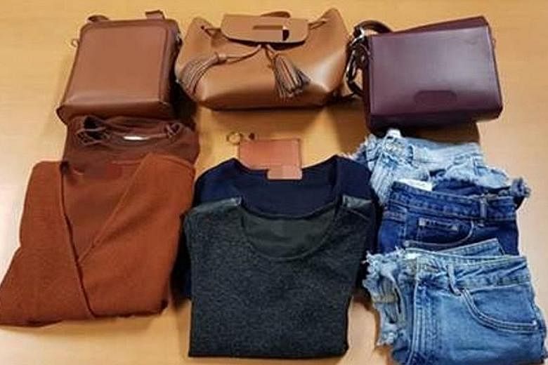 The women, aged 26 and 60, are believed to have used the victim's credit card to spend more than $1,500 on various goods, such as clothes, toiletries, handbags, healthcare products, a pair of spectacles and two stored-value cards.