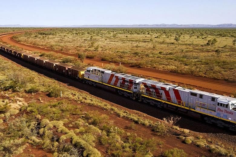Mining giant Rio Tinto this year launched a series of trains installed with "driverless" tech. The trains carry iron ore from remote mines to coastal ports, without having to swop drivers along the way. PHOTO: RIO TINTO