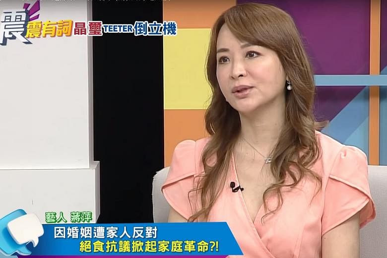 Taiwanese actress Jiang Ping at a talk show speaking about events leading to a divorce that occurred some 20 years ago. 