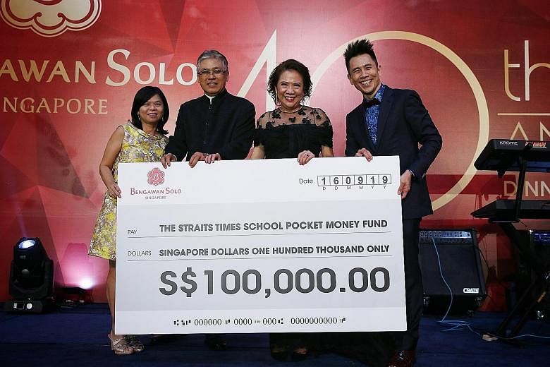 (From left) The Straits Times School Pocket Money Fund's general manager Tan Bee Heong and trustee Han Jok Kwang, Bengawan Solo's managing director Anastasia Liew and her son Henry Liew, director of Bengawan Solo, at the Shangri-La Hotel yesterday. S