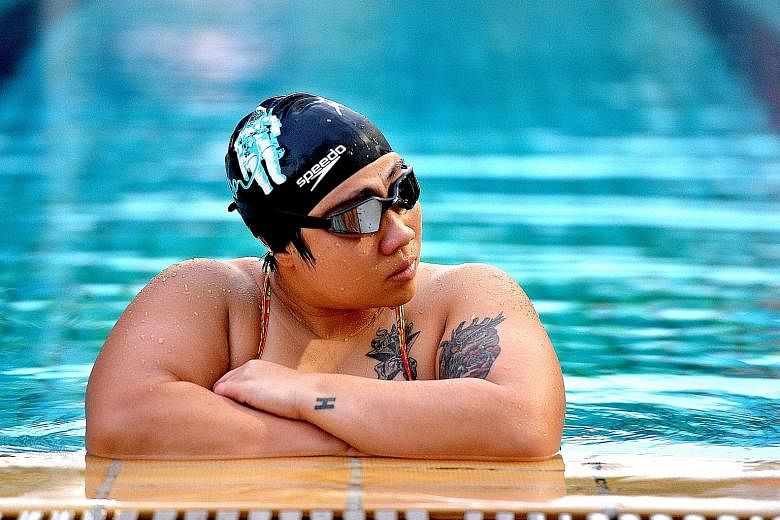 Swimming away from her sport, Theresa Goh now wants to learn more about issues that are close to her heart. ST FILE PHOTO