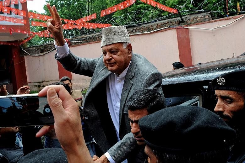 In this photo taken on May 23, Mr Farooq Abdullah, former chief minister of Jammu and Kashmir, flashes a victory sign after winning a Parliament seat. PHOTO: AGENCE FRANCE-PRESSE