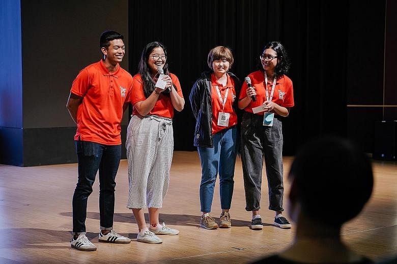 (From left) Mr Nathan Edward Lee (Temasek Poly), 22, Ms Olivia Lim (Nanyang Poly), 19, Ms Melissa Tng (Nanyang Poly), 31, and Ms Layla Natasha Omarrudin (Singapore Poly), 19, presenting their idea on void decks as community spaces. Minister for Socia