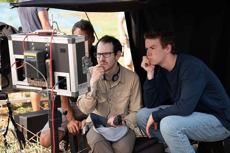 Director Ari Aster (left) on the set of Midsommar with actor Will Poulter.