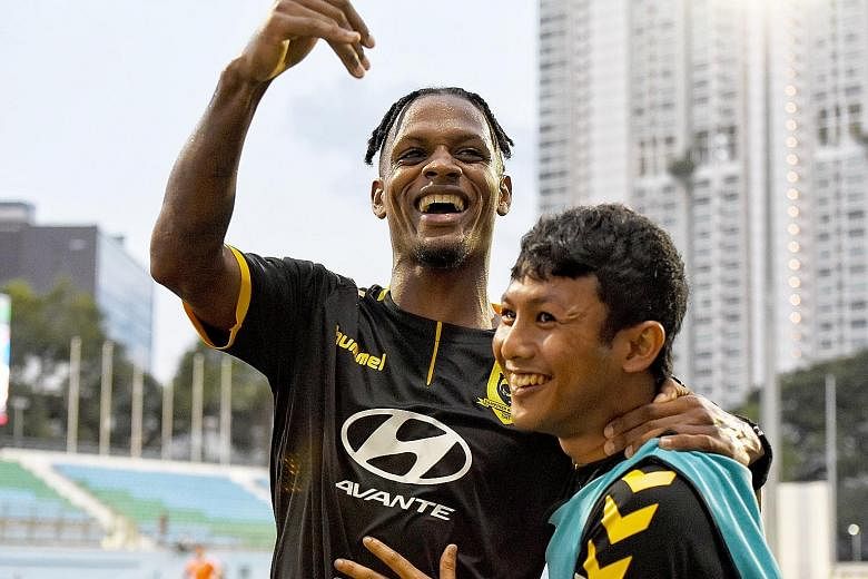 Jordan Webb celebrating with Zulfadhmi Suzliman after scoring a goal back in July. His strike last night in Bandar Seri Begawan gave Tampines full points and keeps their hopes of finishing second alive. ST FILE PHOTO