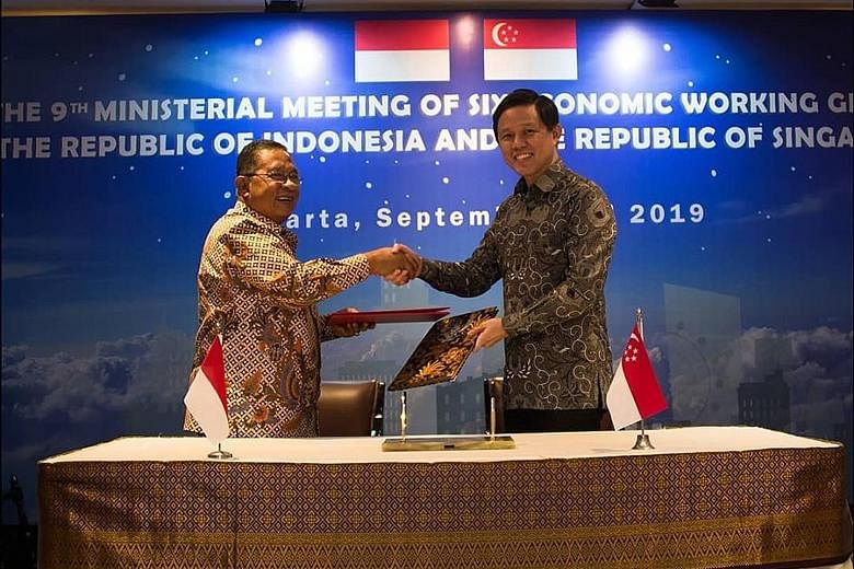 Minister for Trade and Industry Chan Chun Sing with Indonesian Coordinating Minister for Economic Affairs Darmin Nasution in Jakarta on Monday. They discussed progress in economic cooperation between both countries.