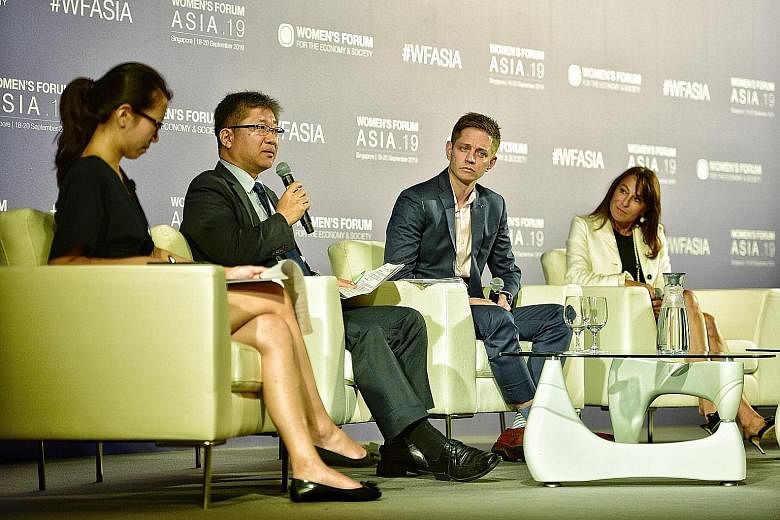 At Women's Forum Asia were (from left) moderator Irene Tham and panellists Kim Young Tae, secretary-general of the International Transport Forum; Kalle Siebring, Nissan Asia Pacific and Oceania general manager of corporations communications; and Bori