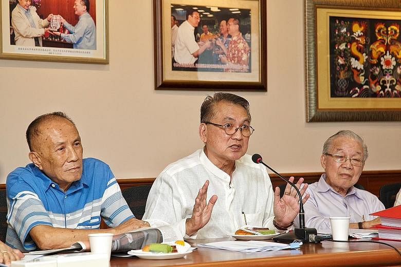 (From left) The Kheng Chiu Tin Hou Kong and Burial Ground's adviser Ngiam Seng Wee, chairman Foo Jong Peng and treasurer Liang Foo Jee at a meeting with reporters yesterday. Mr Foo said he had applied to register the new federation with the Registry 