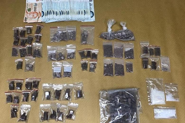Cash and $78,000 worth of drugs were seized in two Central Narcotics Bureau operations on Thursday. CNB is investigating the drug activities of all the five suspects.