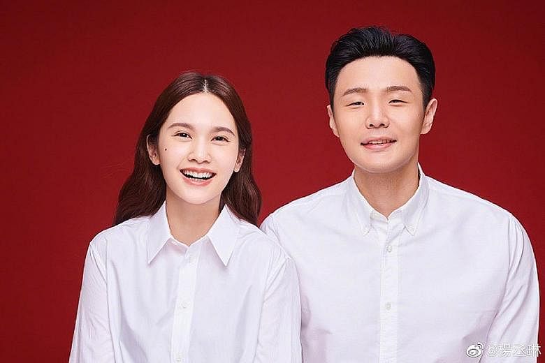 Taiwanese singer Rainie Yang and Chinese singer Li Ronghao in their official wedding portrait.