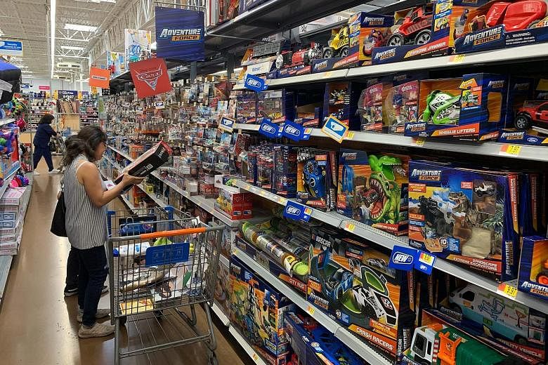 A shopper looking at made-in-China toys at a store in Los Angeles earlier this month. United States President Donald Trump has imposed tariffs on US$360 billion (S$495 billion) worth of Chinese goods and plans to tax nearly all imports from China by 