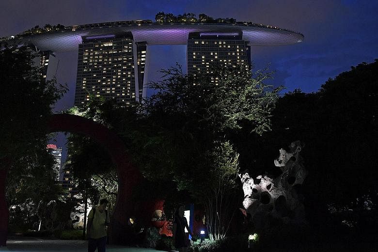 The Marina Bay Sands Hotel and the Sands Skypark as seen from the Gardens by the Bay. Singapore Tourism Board data shows that the standard average occupancy rate rose to a historic high of 93.8 per cent in July while revenue per average room recovere
