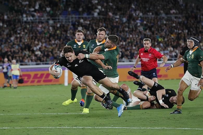 George Bridge scoring New Zealand's first try against South Africa in Yokohama yesterday. The 23-13 win virtually ensures their progress into the quarter-finals as pool winners while the Springboks will have a tougher route to progress beyond the las