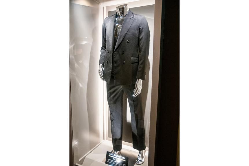 A Dougie Millings suit (above) worn by Paul McCartney in 1965 displayed at the Hard Rock Hotel London.