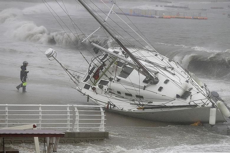 Strong tides hit Ulsan in South Korea as Typhoon Tapah approached the country yesterday. PHOTO: EPA-EFE