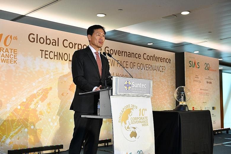 Education Minister Ong Ye Kung speaking at the start of the 10th annual Corporate Governance Week, held at Suntec Singapore Convention and Exhibition Centre yesterday.