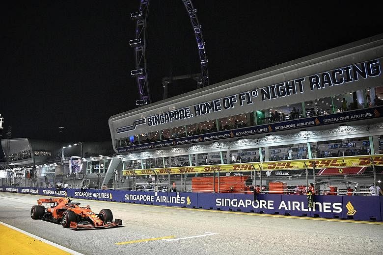 Charles Leclerc burning rubber on the Marina Bay Street Circuit during the 12th Singapore Grand Prix on Sunday. Singapore's current deal to host the night race runs till 2021. ST PHOTO: ARIFFIN JAMAR
