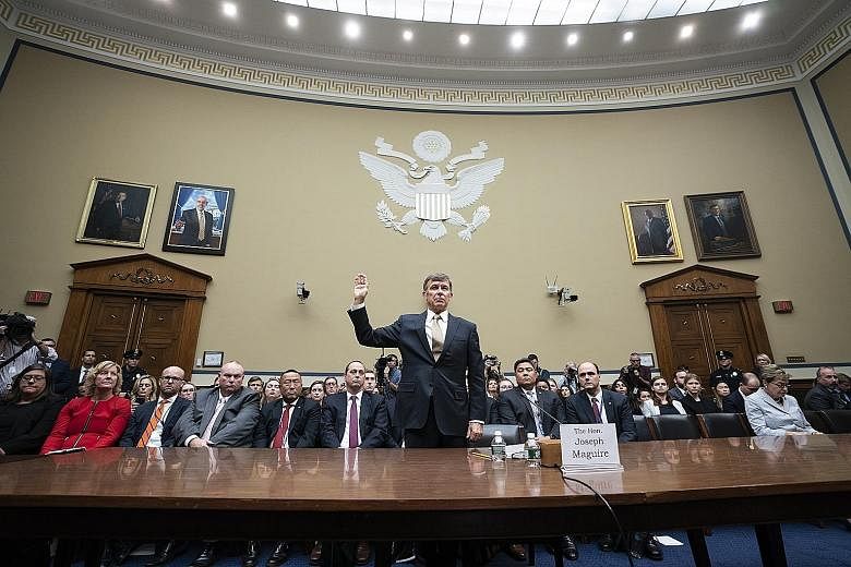 Mr Joseph Maguire, acting director of National Intelligence, testifying before the US House Intelligence Committee in Washington yesterday over the whistle-blower's complaint against President Donald Trump. Mr Maguire told the committee that he belie