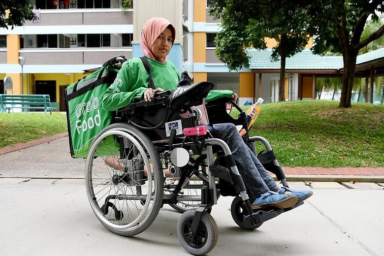 Food-delivery rider Sumaiyah Ghazali, who has cerebral palsy and is unable to walk, has received complaints regarding late deliveries. But when she reaches her destinations, the customers understand and sympathise with her condition. PHOTO: KHALID BA