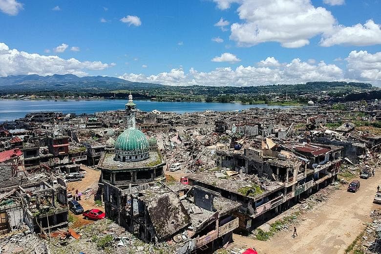 A drone shot of Marawi's commercial hub, which was destroyed during the five months of fighting between Philippine security forces and militants. Till today, the area remains a desolate wasteland covering 250ha that includes the hollowed-out shell of