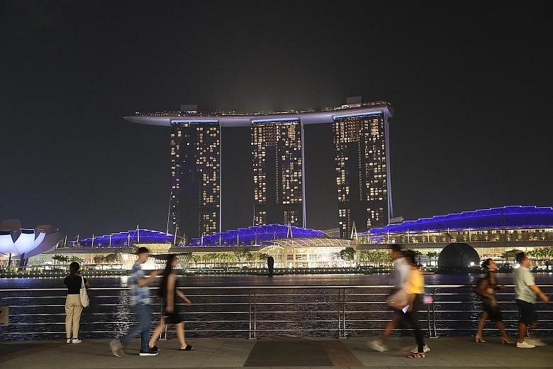 The Lorong Halus bridge is a popular and photogenic spot at night. Singapore's first elevated park connector bridge stretches across the AYE. The iconic view of Marina Bay Sands awaits near the end of the long walk.