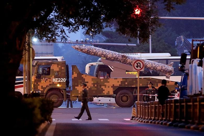 A military vehicle at a parade rehearsal in Beijing last week. The parade will include 15,000 troops, over 160 aircraft and 580 pieces of military equipment.