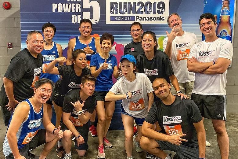 Powering up are (back row from left): Philip Chua, director of Panasonic Singapore's domestic business division; Lim Teck Yin Sport Singapore CEO; Lion Global Investors' chief marketing officer Lim Shyong Piau; and Kiss92 DJ Jason Johnson; (centre row fro