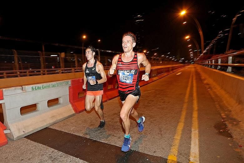 Soh Rui Yong and Nick Impey ran side by side throughout the ST Run 2019 yesterday morning - until the last stretch, when Impey powered ahead to win the race. Both runners bettered the 2018 winning time. 