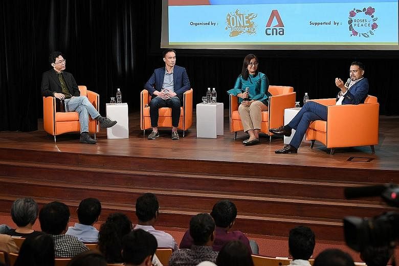 Panel members (from left) Adrian Heng, Leonard Lim, Nadia Ahmad Samdin and David Reddy at the second session of "Regardless of Race - The Dialogue" yesterday, where some of the 170 Singaporeans in attendance shared their views on issues such as navig