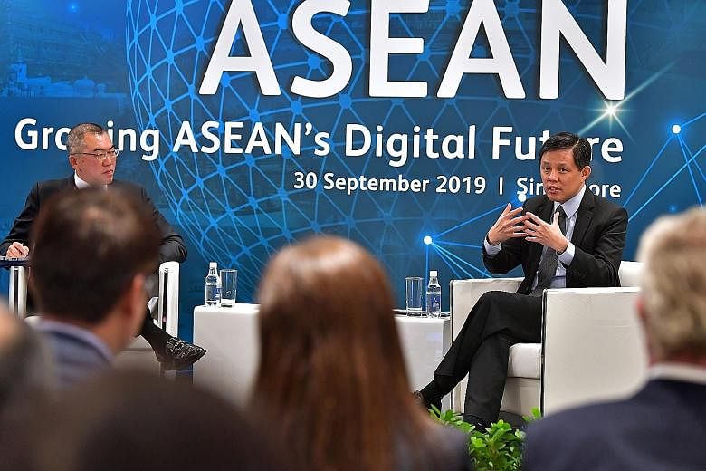 Minister for Trade and Industry Chan Chun Sing in a dialogue moderated by Mr Chia Kim Huat, regional head of corporate and transactional practice at Rajah & Tann, at the Digitise Asean conference yesterday.