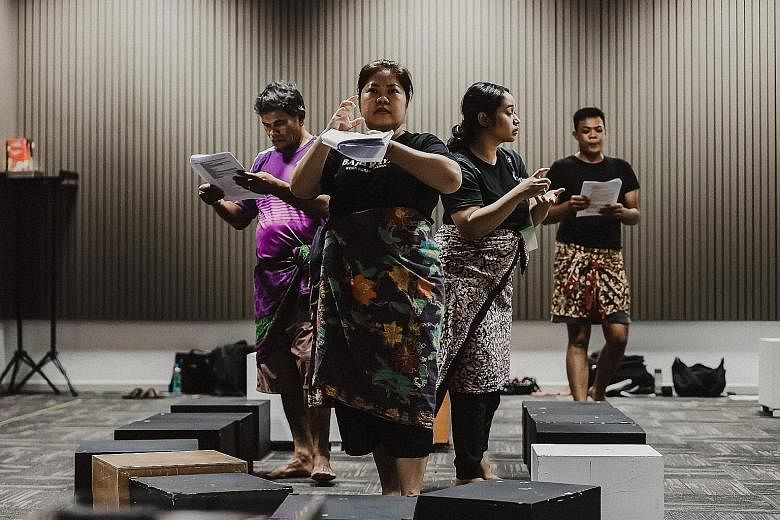 (From left) Roslan Kemat, Dalifah Shahril, Suhaili Safari and Farez Najid during a rehearsal of the verbatim performance Air, which explores the displacement of the Orang Seletar, an indigenous community in Singapore.